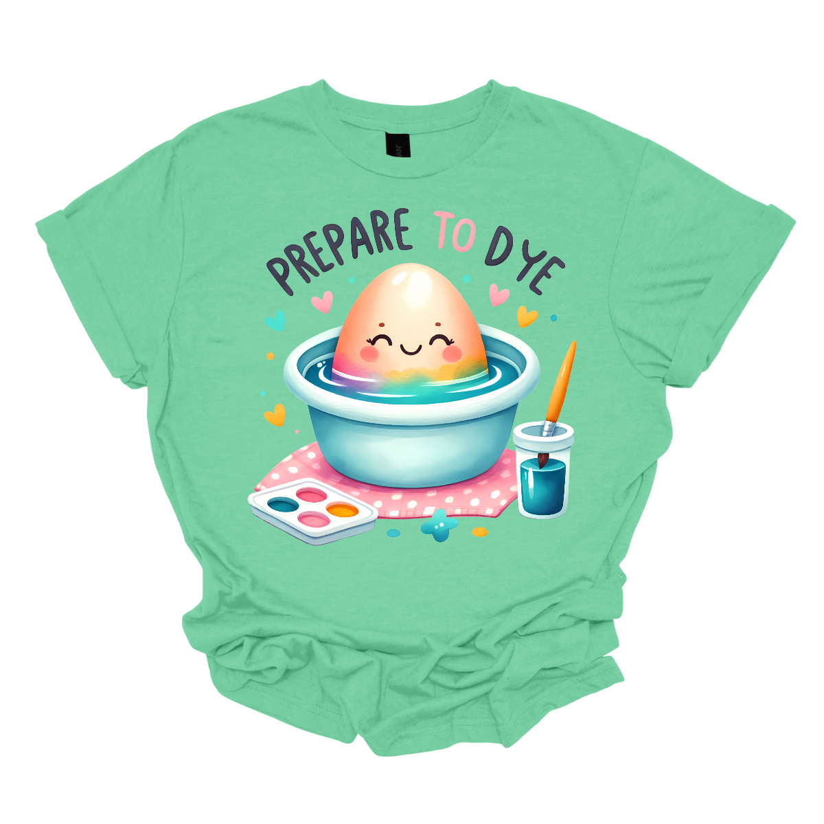 Get ready to add a splash of color to your Easter celebrations with our 'Prepare to Dye' T-shirt! This playful design features an Easter egg sitting in a bowl of dye alongside a paintbrush, capturing the excitement of decorating eggs for the holiday. Shop at Gorgeousware.com