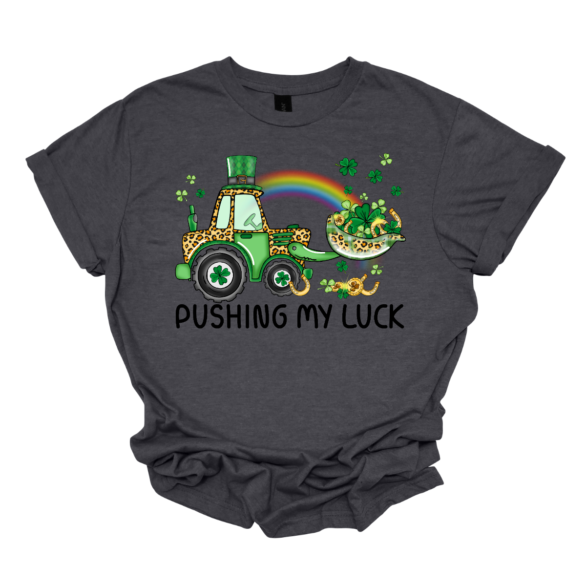 A playful and whimsical garment that captures the spirit of the holiday with a touch of fun. This shirt features a lively design with a tractor playfully shoveling a load of shamrocks, creating a unique and charming representation of pushing one's luck in a St. Patrick's Day context. The design showcases a tractor adorned with shamrocks, symbolizing the act of "pushing" luck in a light-hearted and festive manner. Shop at Gorgeousware.com