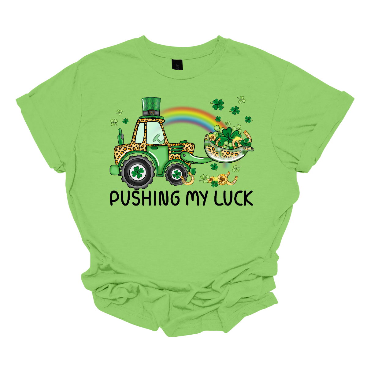 A playful and whimsical garment that captures the spirit of the holiday with a touch of fun. This shirt features a lively design with a tractor playfully shoveling a load of shamrocks, creating a unique and charming representation of pushing one's luck in a St. Patrick's Day context. The design showcases a tractor adorned with shamrocks, symbolizing the act of "pushing" luck in a light-hearted and festive manner. Shop at Gorgeousware.com