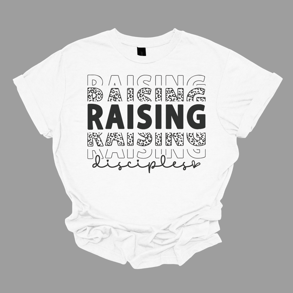 Showcase your mission with our "Making Disciples" t-shirt. The design features the word "Making" stacked vertically three times, creating a bold and eye-catching visual. Below this powerful repetition, "disciples" is elegantly scripted in cursive, adding a touch of sophistication and flow. Shop at Gorgeousware.com