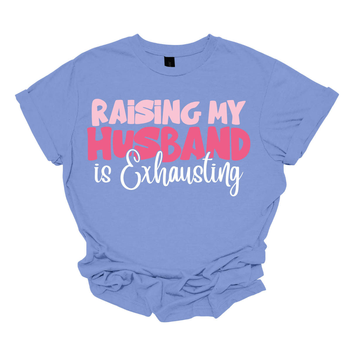 This T-shirt features the humorous phrase "Raising My Husband Is Exhausting" prominently across the chest. The text is creatively arranged in a mix of playful and quirky fonts, each each line standing out with a unique style. The color palette is a soft and vibrant pink, with a varying shade to enhance the fun and lighthearted vibe of the design.  Shop at Gorgeousware.com