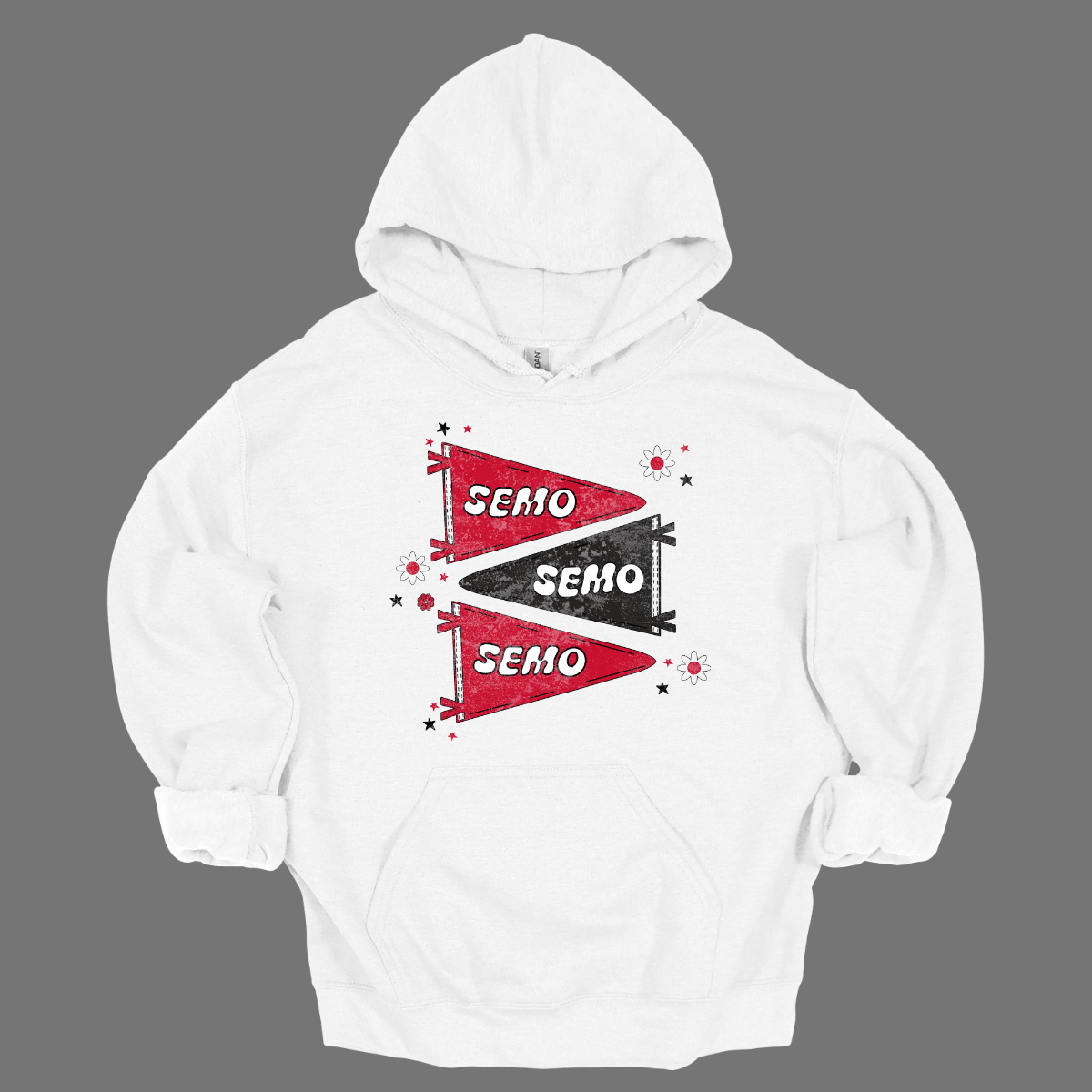 Show off your fully licensed Redhawk pride in youth sizes, with this retro-inspired SEMO design! Featuring three vintage-style pennants alternating in bold red and black, the layout gives a dynamic, old-school vibe. Each pennant is accented with groovy bubble lettering spelling “SEMO” in a playful wave, adding a fun twist to the classic look. Surrounding the pennants are a mix of retro red and black stars and flower motifs, bringing a nostalgic flair. 
Shop at Gorgeousware.com today!