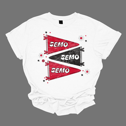 Show off your fully licensed Redhawk pride with this retro-inspired SEMO design! Featuring three vintage-style pennants alternating in bold red and black, the layout gives a dynamic, old-school vibe. Each pennant is accented with groovy bubble lettering spelling “SEMO” in a playful wave, adding a fun twist to the classic look. Surrounding the pennants are a mix of retro red and black stars and flower motifs, bringing a nostalgic flair that feels both timeless and fresh. Shop at Gorgeousware.com today!