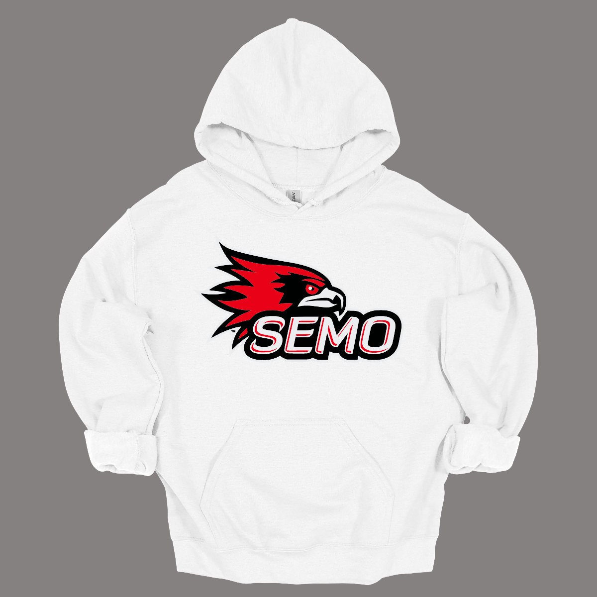 The apparel design for SEMO (Southeast Missouri State University) features the bold and iconic SEMO Redhawk logo prominently displayed across the chest or front. The Redhawk logo typically showcases a fierce red hawk in mid-flight or in a dynamic, stylized form, using shades of red, black, and white. Below this powerful symbol, the word "SEMO" is written in the university's signature font, often in all capital letters. Shop at Gorgeousware.com