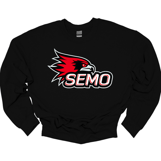 The apparel design for SEMO (Southeast Missouri State University) features the bold and iconic SEMO Redhawk logo prominently displayed across the chest or front. The Redhawk logo typically showcases a fierce red hawk in mid-flight or in a dynamic, stylized form, using shades of red, black, and white. Below this powerful symbol, the word "SEMO" is written in the university's signature font, often in all capital letters. Shop at Gorgeousware.com