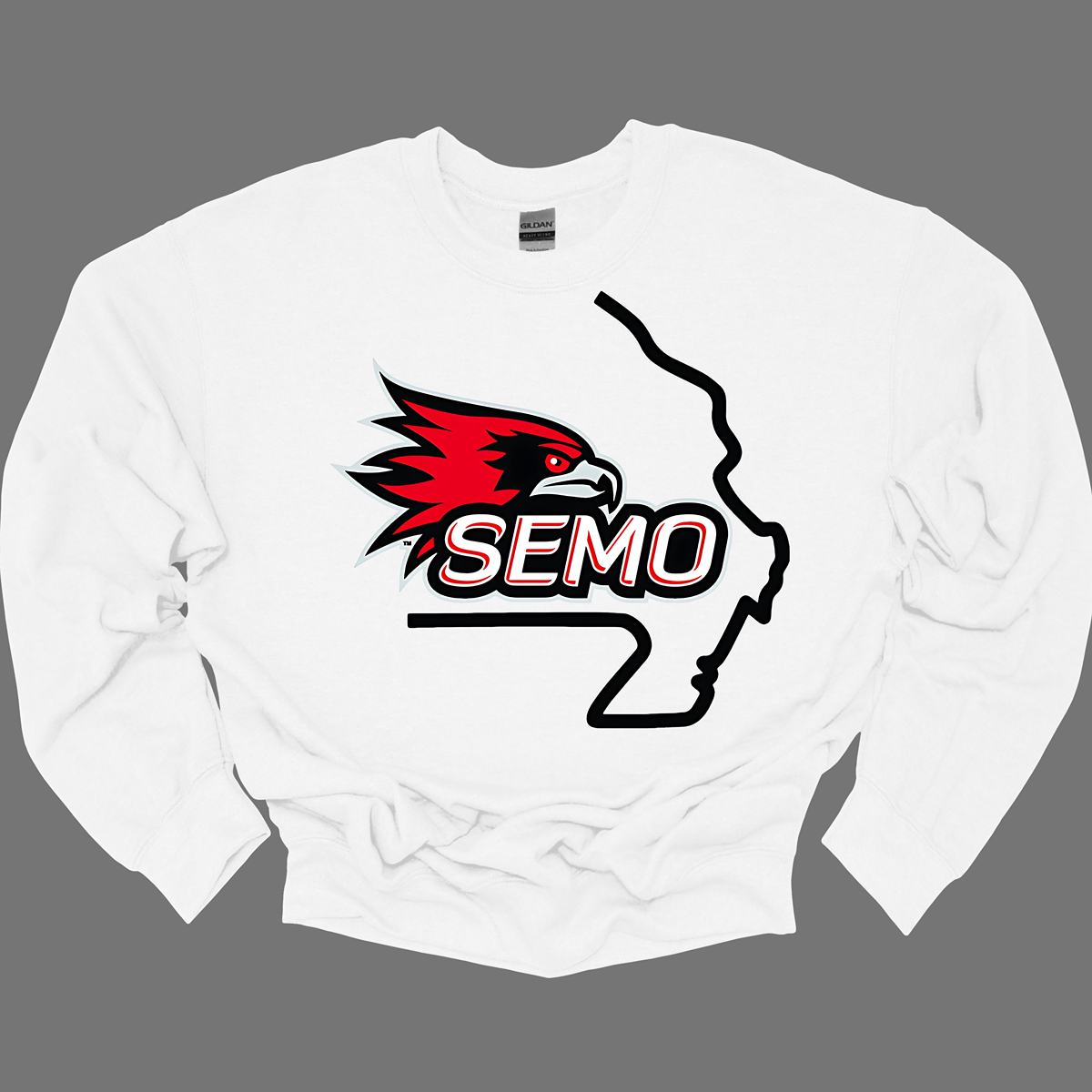 This striking t-shirt features a bold red hawk design at the center, capturing the spirit and fierceness of this majestic bird. The hawk is beautifully outlined in black and grey, seamlessly integrated within the silhouette of the state of Missouri, showcasing pride in both nature and locality. Below the hawk, the word "SEMO" pops in vibrant bubble letters, adding a playful touch that complements the overall design.  Shop at Gorgeousware.com