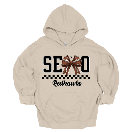 Bold black SEMO lettering with a football bow replacing the “M,” checkerboard underline, and “Redhawks” in sleek cursive. Available in crewneck and hoodie—perfect for game day or everyday wear! 
Shop at Gorgeousware.com today!
