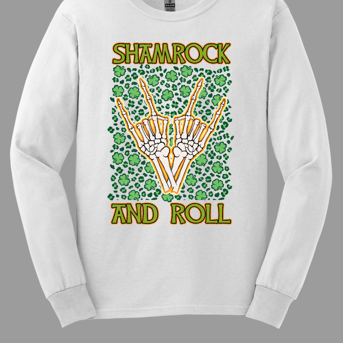 Introducing our "Shamrock and Roll" T-shirt – a unique and edgy garment that combines the spirit of St. Patrick's Day with a rock 'n' roll twist. This shirt features a dynamic design with skeleton fingers rocking out amidst a backdrop of vibrant shamrocks, creating a visually striking and energetic representation of the theme. Shop at Gorgeousware.com