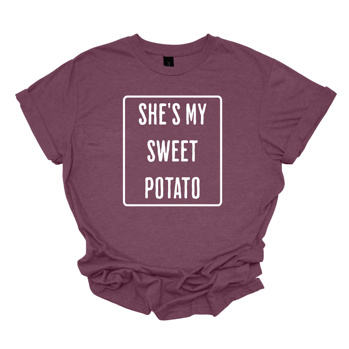 The first t-shirt features the phrase "She’s My Sweet Potato" in a basic, bold font. The text is prominently displayed and encircled by a solid white border, which adds a clean and crisp contrast to the font, making the words stand out. Shop Gorgeousware.com