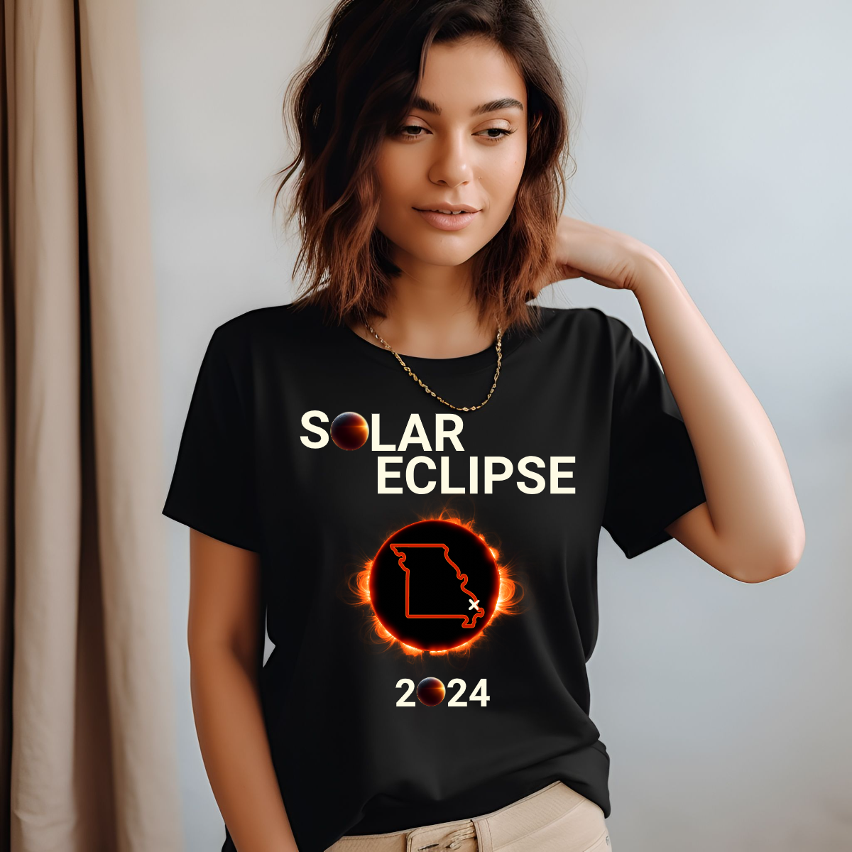 Embrace the celestial dance with our 'Solar Eclipse' t-shirt! Capturing the awe-inspiring beauty of the cosmos, this design features the mesmerizing moment when the moon gracefully eclipses the sun over the iconic silhouette of Missouri.  Shop at Gorgeousware.com