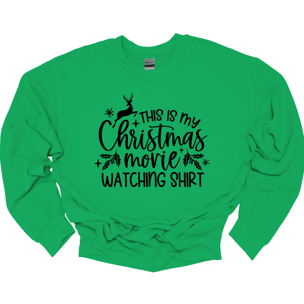 This cozy t-shirt features the playful phrase "This Is My Christmas Movie Watching Shirt" in a straightforward, easy-to-read font. The words "Christmas Movie" are beautifully highlighted in an elegant cursive font, adding a touch of festive flair. Shop Gorgeousware.com