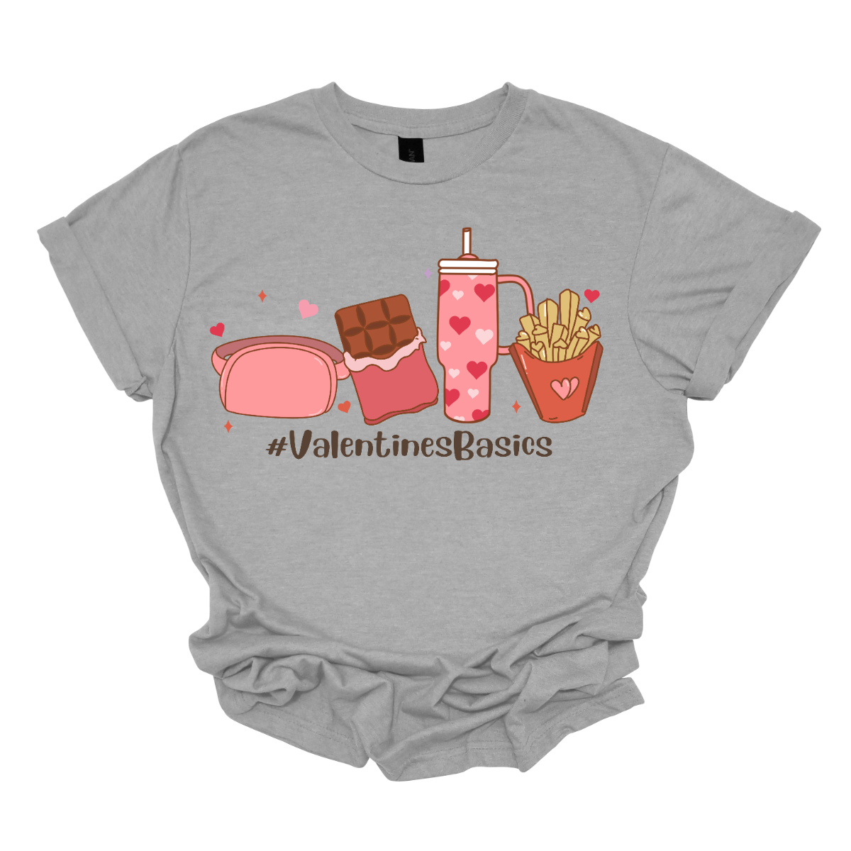 Introducing our "#ValentineBasics" T-shirt – a stylish and playful ensemble that captures the essence of Valentine's Day with a touch of everyday essentials. This shirt is a trendy celebration of the things that make this romantic holiday uniquely delightful. The design features the hashtag "#ValentineBasics" displayed prominently, complemented by illustrations of a Lululemon shoulder bag, a box of chocolates, the iconic Stanley Cup, and a side of fries. Shop at Gorgeousware.com