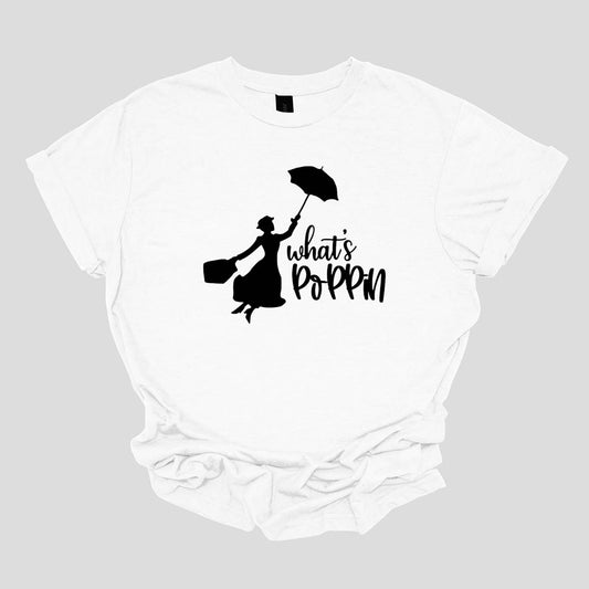 This t-shirt features a chic and playful design with the phrase "What's Poppin'" rendered in an elegant black cursive font. The flowing script adds a touch of sophistication and style to the design. Next to the text is a silhouette of Mary Poppins, capturing the iconic character's classic charm and whimsical essence. The silhouette showcases Mary Poppins with her signature umbrella and carpet bag, adding a delightful and nostalgic touch to the shirt. Shop Gorgeousware.com