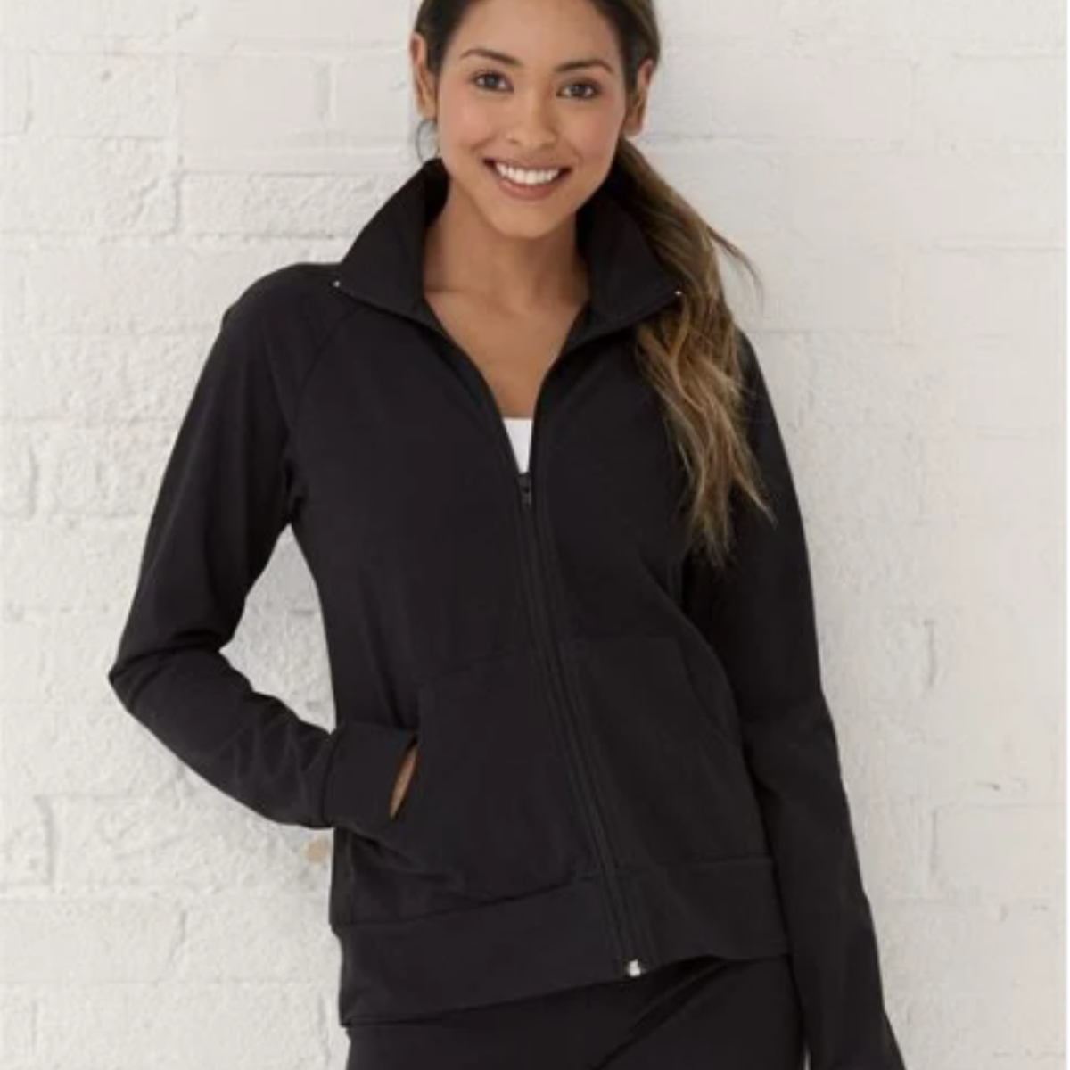 Elevate your wardrobe with this stylish women's black solid practice jacket. Made from a comfortable 90/10 cotton-spandex blend, it offers the perfect balance of flexibility and durability for your active lifestyle. The sleek design features a subtle Jackson Tribe Baseball logo on the left sleeve, adding a touch of team spirit. Ideal for cool days or casual outings, this jacket combines functionality with a chic, athletic look. Stay comfortable and confident as you support your team!