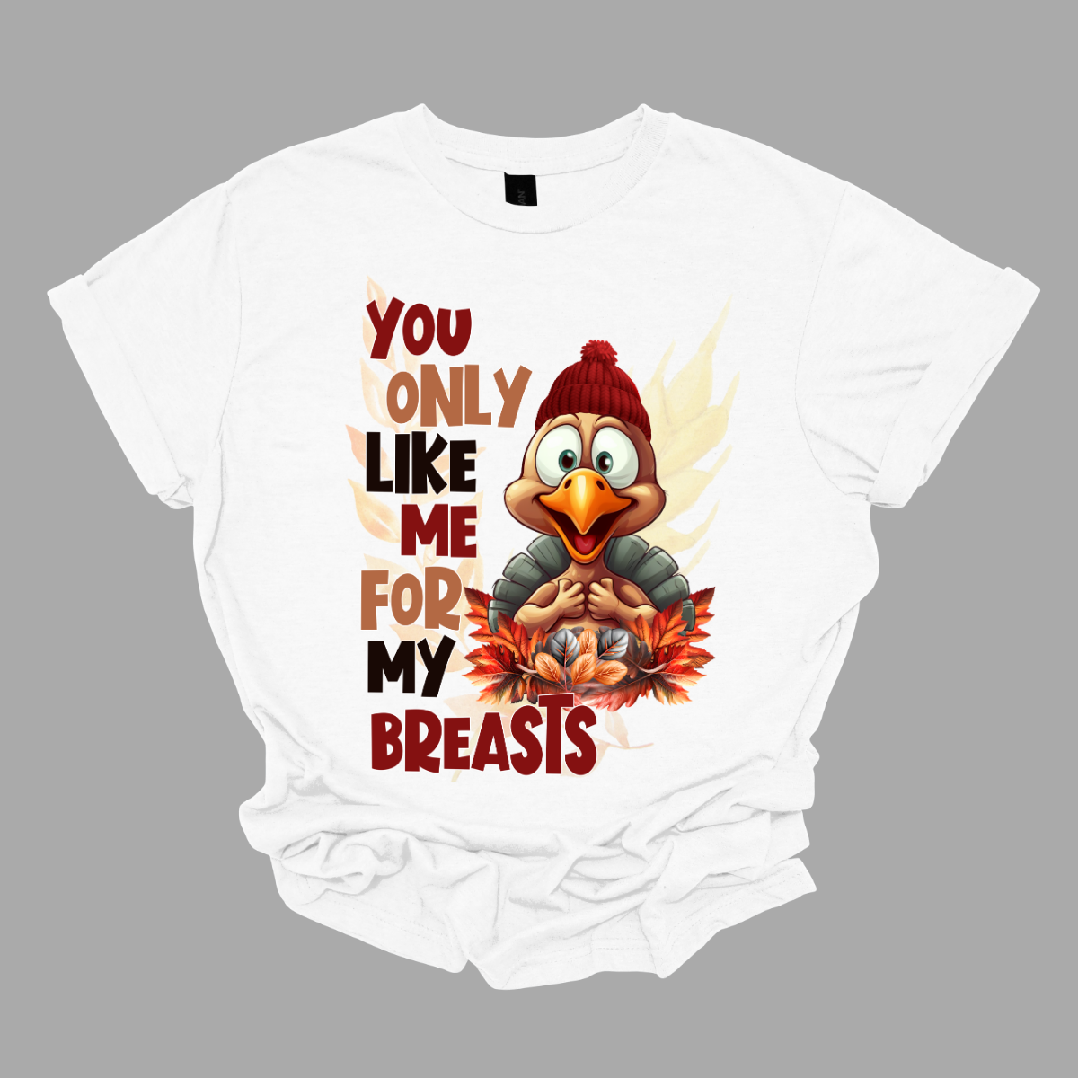 Turn heads and tickle funny bones with our “You Only Like Me for My Breasts” t-shirt. Featuring a cheeky turkey covering its chest, this shirt delivers a hilarious twist on Thanksgiving traditions. Perfect for adding a touch of humor to your holiday festivities, it’s made from soft, comfortable fabric that’s ideal for lounging or celebrating with family and friends. Shop at Gorgeousware.com