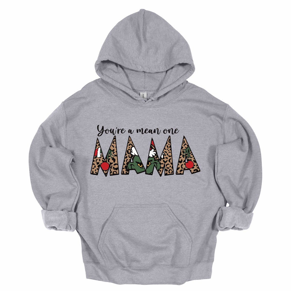  The phrase "You're a Mean One Mama" takes center stage, with "You're a Mean One" written in elegant black cursive font that flows beautifully across the fabric.&nbsp;The standout element is the word "Mama," which is rendered in bold, eye-catching letters. Each letter of "Mama" is filled with a quirky depiction of the Grinch, set against a vibrant cheetah print background. Shop Gorgeousware.com